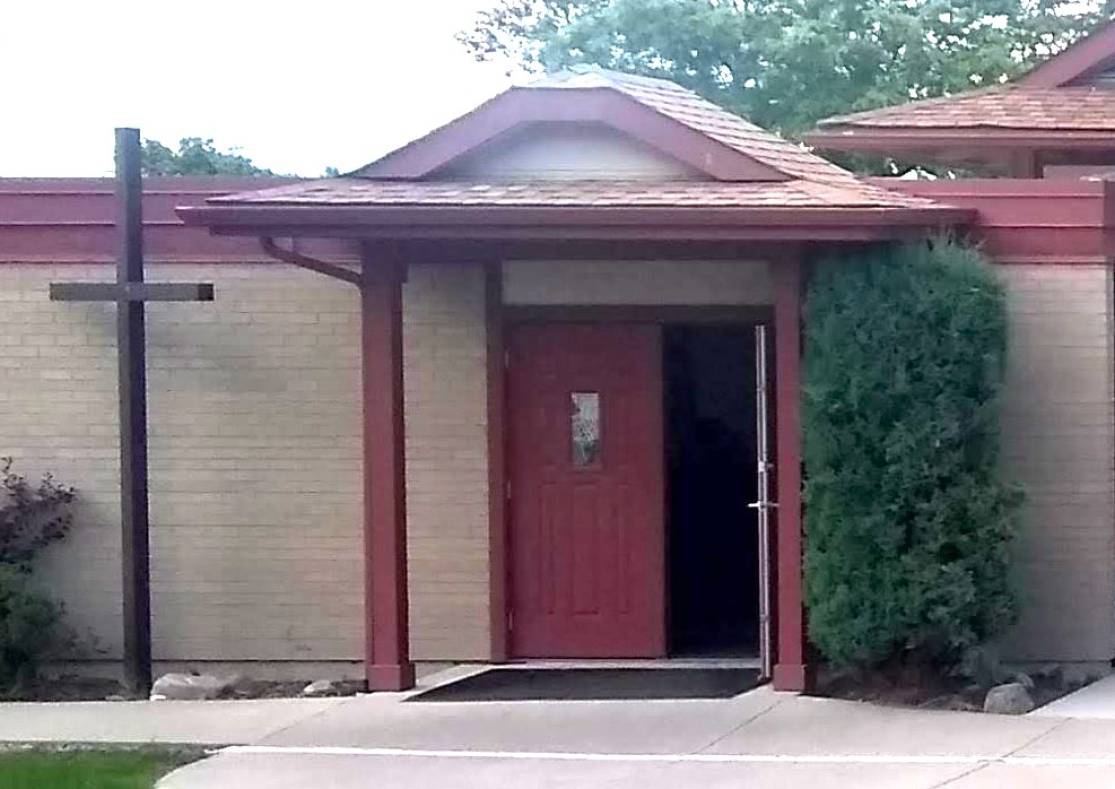 Image of the church with an open door